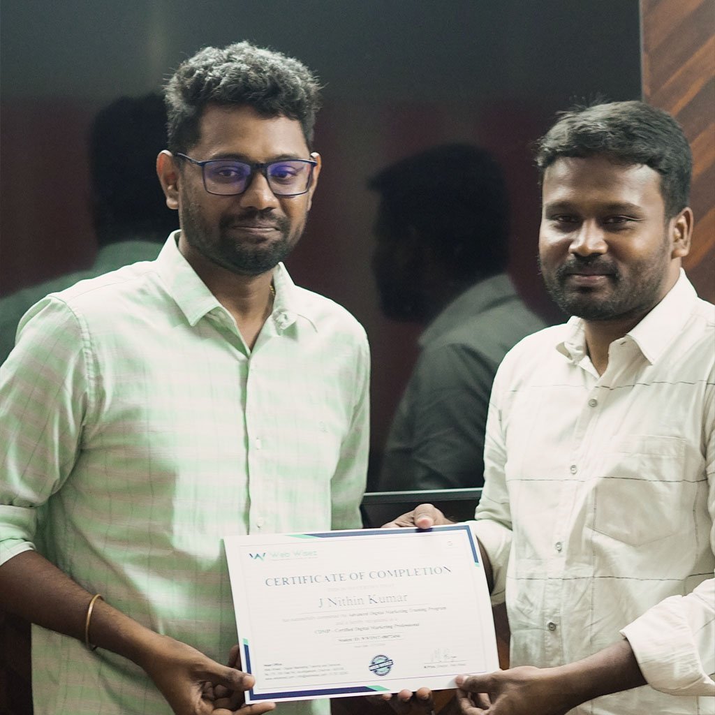 Student receiving certificate after completing a digital marketing course